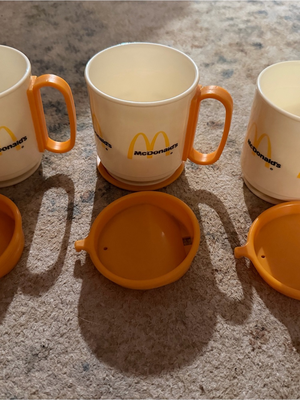 McDonald's White Plastic Mugs with Orange Handles and Lids - Set